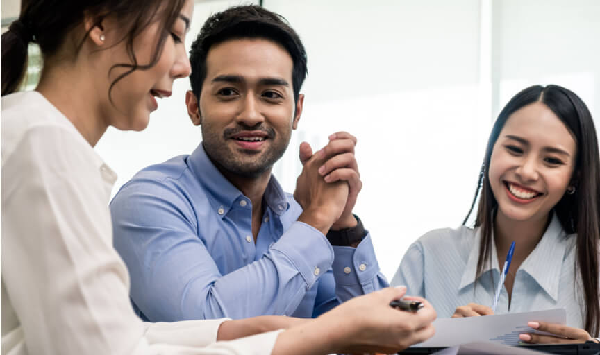 New recruits in an office going through employee onboarding.