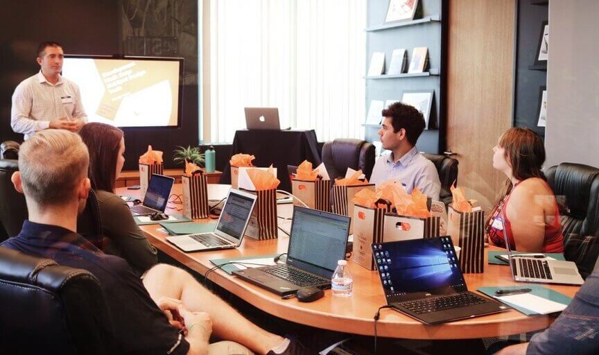 Trainees participate in an employee training session