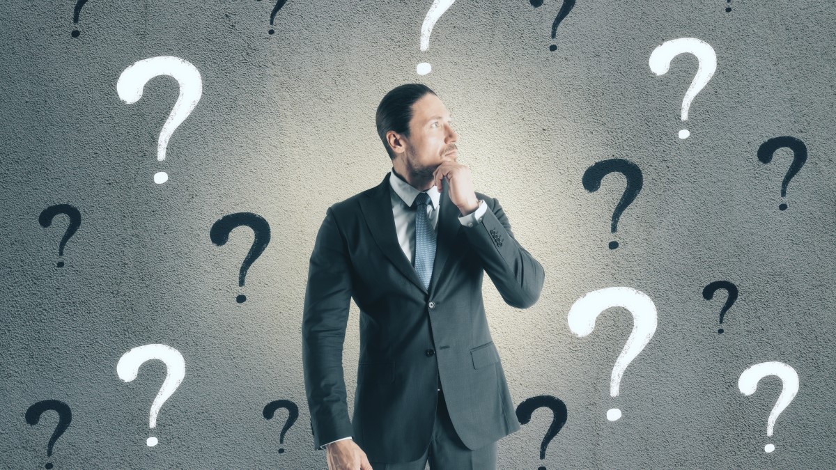 A man using decision-making surveys to answer lots of questions he has