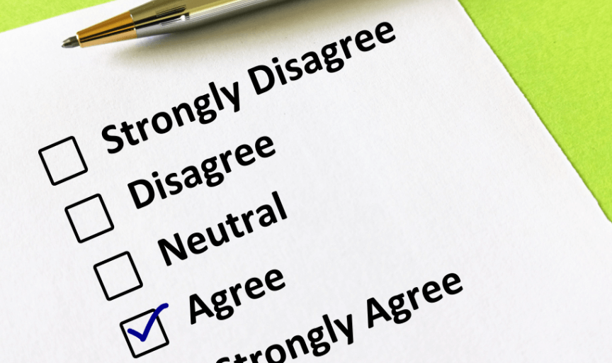 Close-up image of a questionnaire, showing a completed Likert scale example