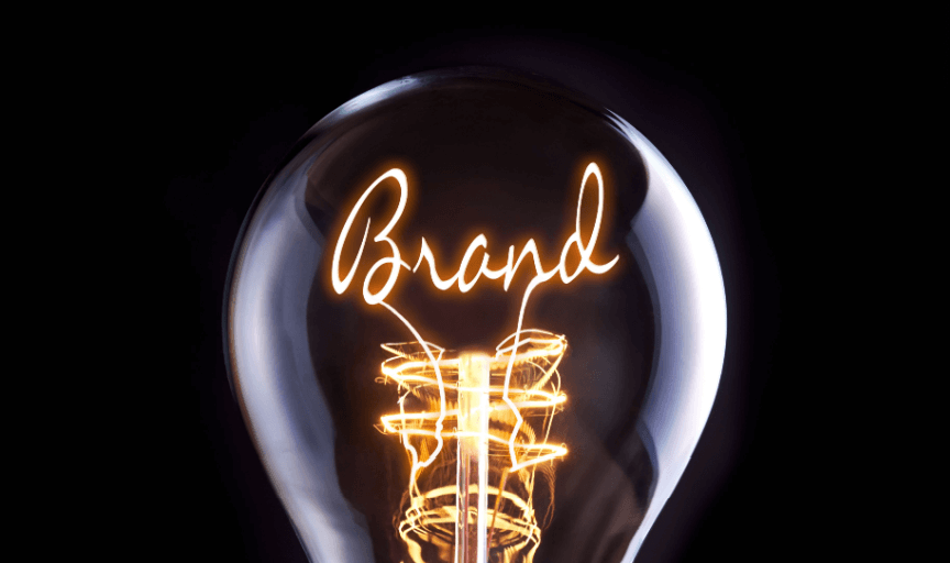 Image of a light bulb with the filament spelling the word 'Brand' to ullustrate the concept of brand equity